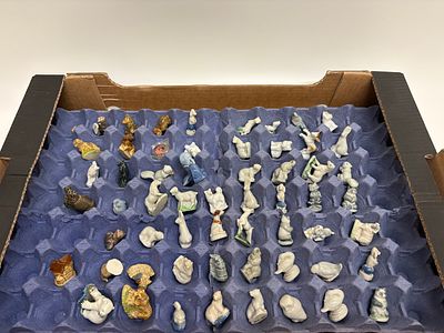 A Collection of Wade Red Rose Tea Canadian Series Ceramic Figurines and Collectors Club Pin. A 