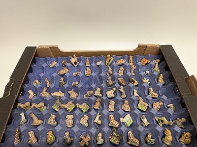 A Collection of Wade Whimsies Red Rose Tea Ceramic Figurines. A collection of Wade Whimsies 