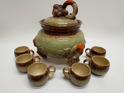 Vina, A Majolica Style Ceramic Tureen and Cup Service, Mid-Century, Grape Relief Decoration. A 