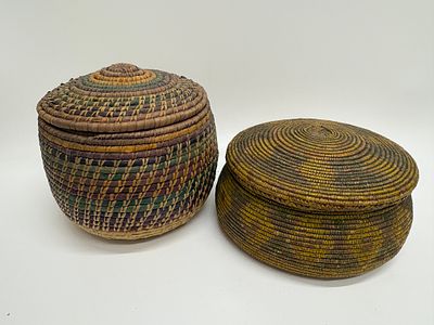 Two Lidded Coiled Baskets, Woven Plant Fibre, Mid-20th Century. A pair of hand-woven Hopi 