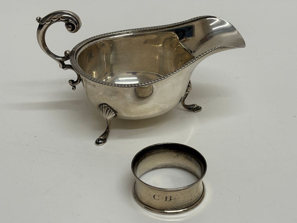Lot 212: Arthur J. Pepys, George III Style, Sauce Boat and Napkin Ring, Sterling Silver 105.20g