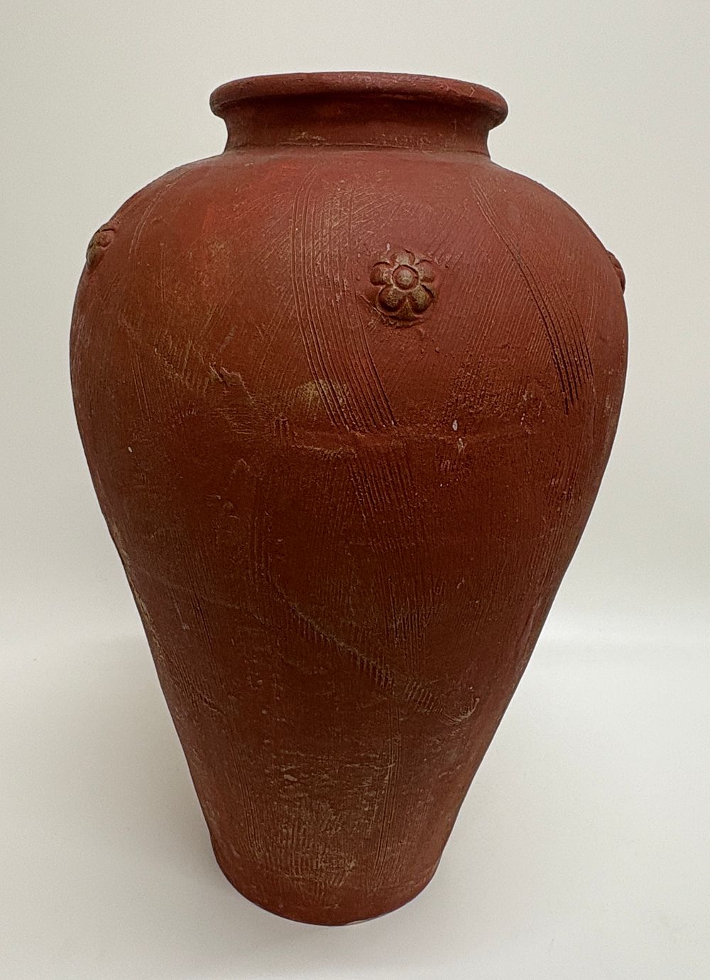 Lot 199: Large Earthenware Ovoid Jar, 20th Century, with Incised Combing and Applied Rosettes