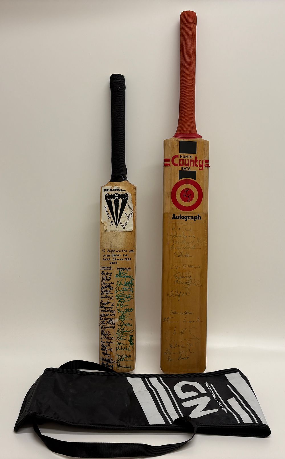 Lot 560: A Pair of Signed Cricket Bats including Durham CCC and 2008 Deaf Ashes with Vintage Ephemera, Unauthenticated