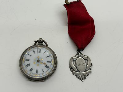 A Pair of Silver Items Comprising a 1962 N.S.C.A. Prize Medal and a Swiss .800 Silver Pocket 