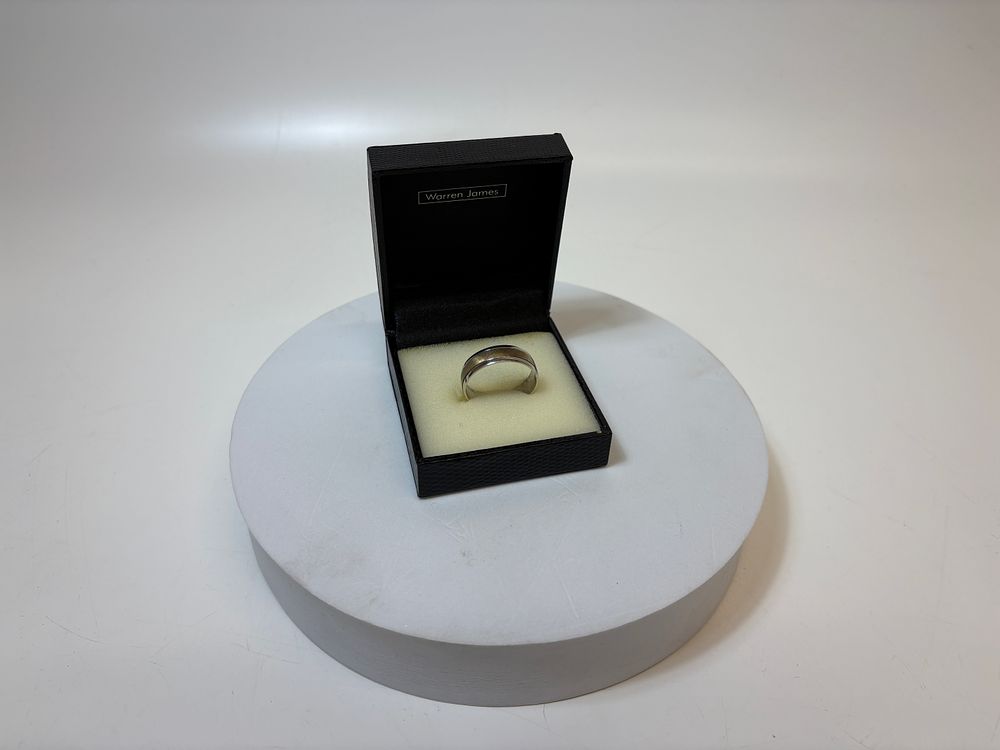 Lot 645: A Warren James 9 Carat Gold and Sterling Silver Two-Tone Band Ring circa Gross 5.8 Size Larger then "Z"