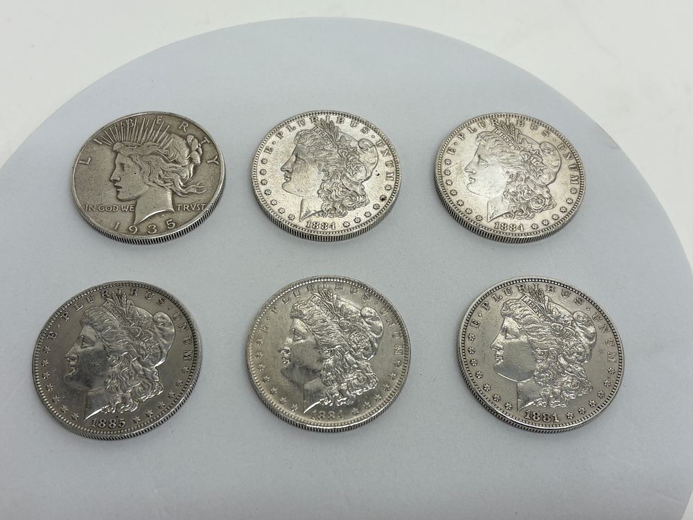 Lot 1: A Collection of United States Silver Dollar Coins