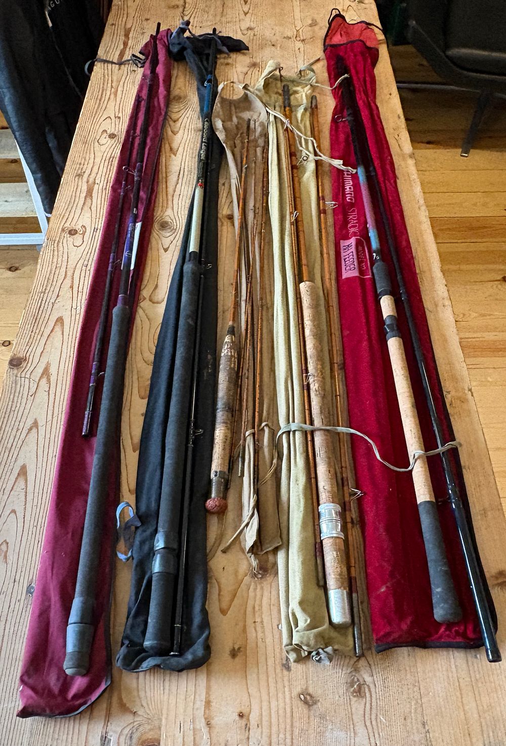 Lot 654: A Collection of Modern Carbon Fibre and Vintage Split Cane Fishing Rods