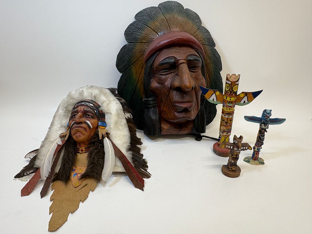 Lot 663: A Collection of Native American Themed Decorative Items Including Wall Plaques and Miniature Totem Poles