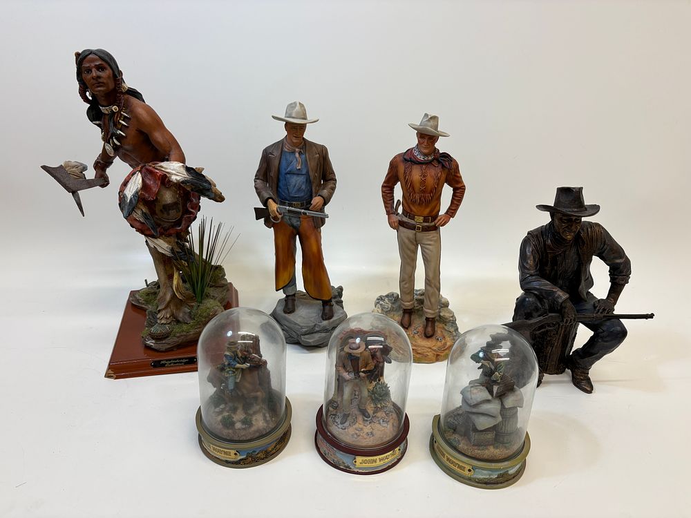 Lot 666: An Assortment of Western-Themed Figurines and John Wayne Collectibles