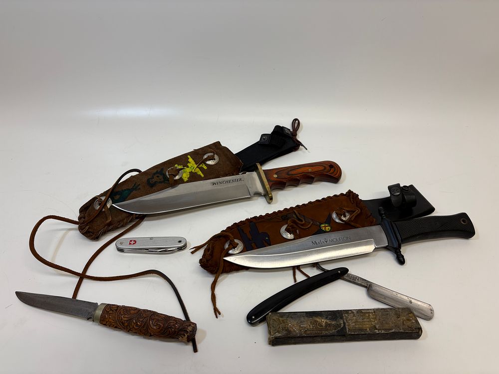 Lot 668: A Collection of Edged Tools and Knives including Winchester and Muela Examples