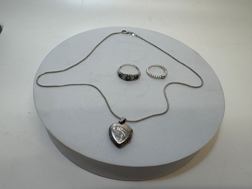 Lot 1C: A Group of Sterling Silver Jewellery including a Heart Locket and Rings