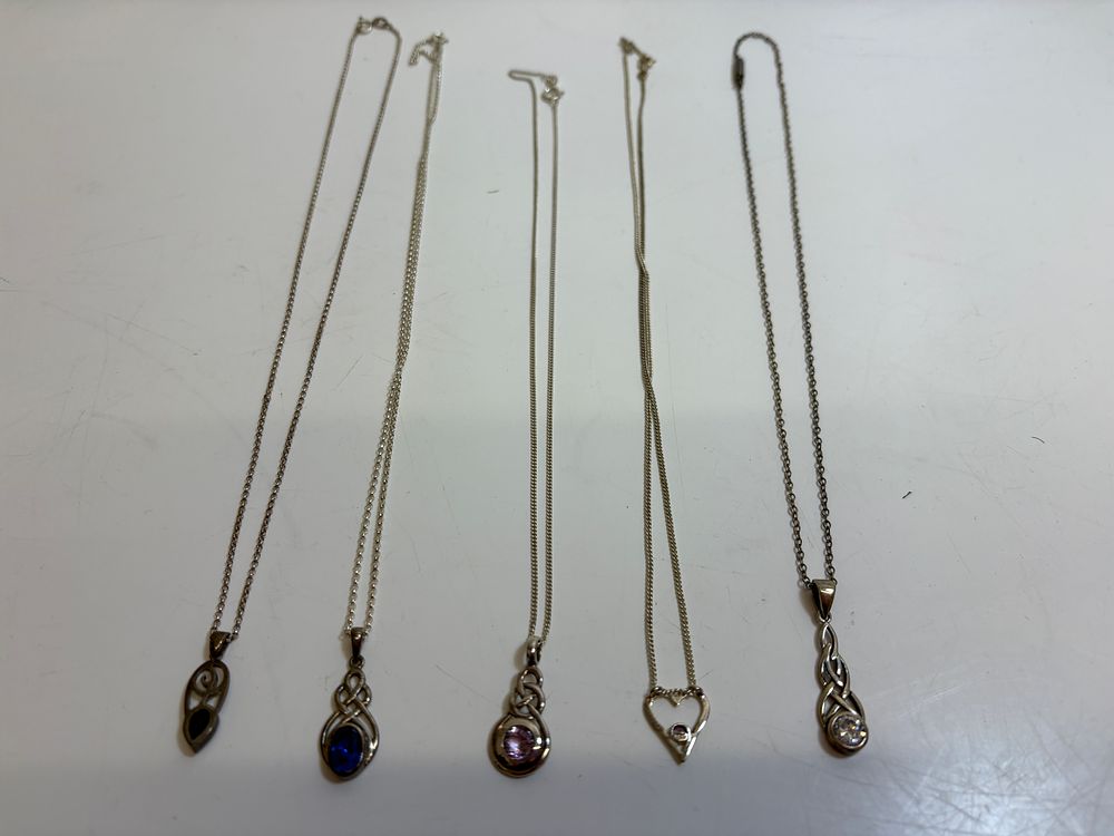 Lot 2B: A Collection of Silver and Silver-Toned Celtic Style Stone Set Pendant Necklaces