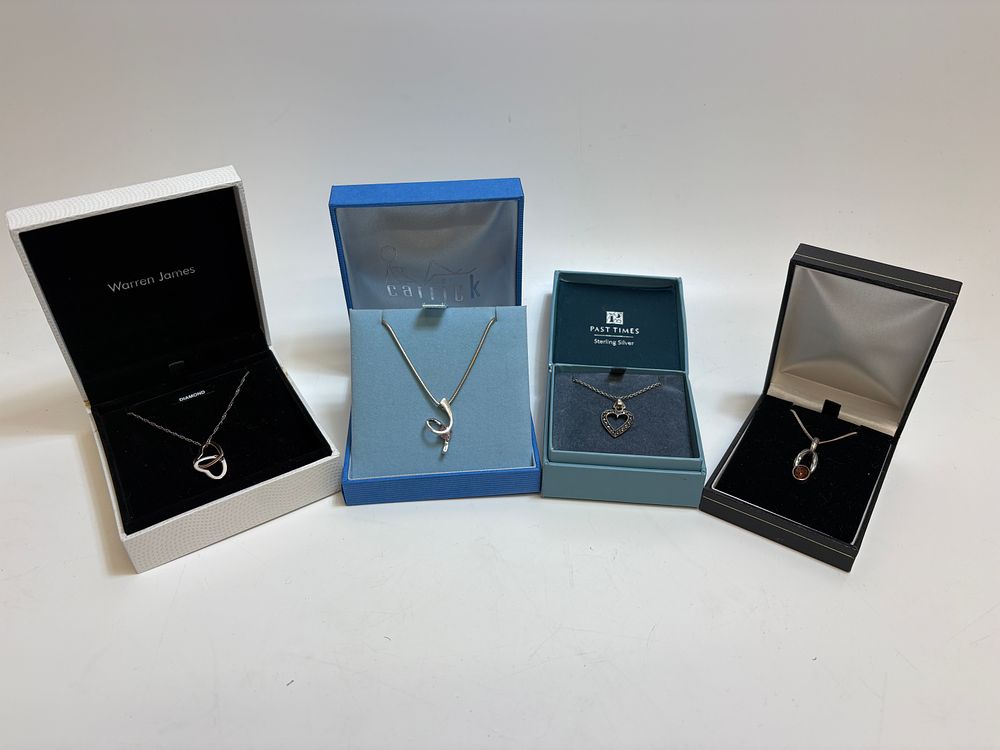 Lot 2C: A Collection of Boxed Necklaces Including Warren James, Carrick and Past Times