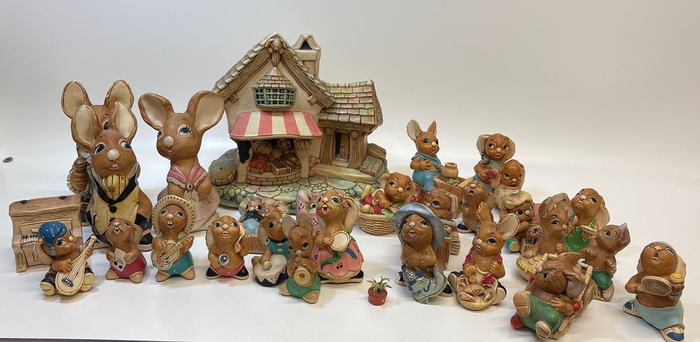Lot 682: A Large Collection of Pendelfin Hand-Painted Stonecraft Rabbit Figurines and Buildings