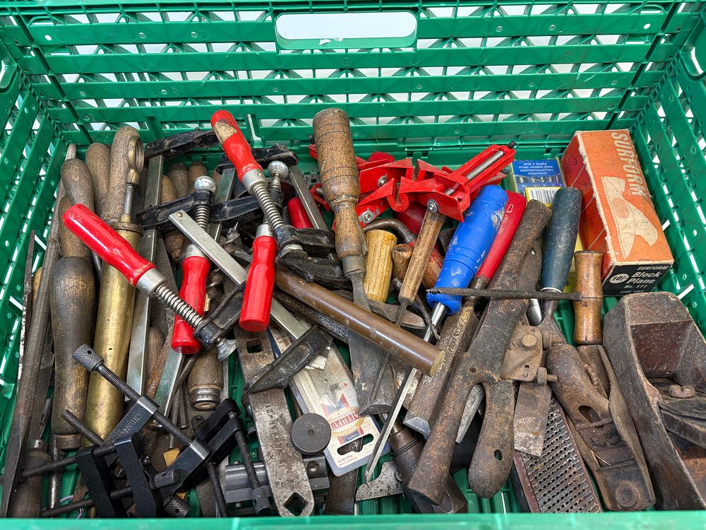 Lot 687: An Assortment of Vintage and Contemporary Hand Tools including Clamps, Planes, and Abrasive Tools