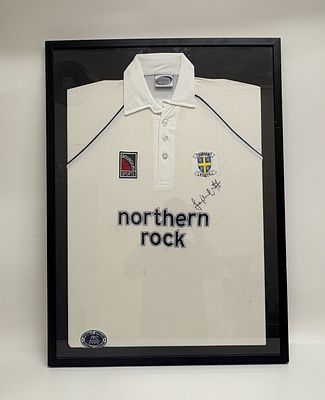 Framed Steve Harmison Signed Durham County Cricket Club Jersey. A framed short-sleeved cricket 