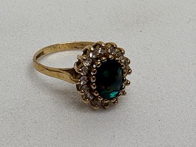 A green gemstone and clear stone cluster ring 9ct, size L , 2.29g gross . A vintage-style dress 