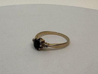 An 18ct yellow gold sapphire and diamond three-stone ring. size Q , 2.86g gross . An 18ct yellow 