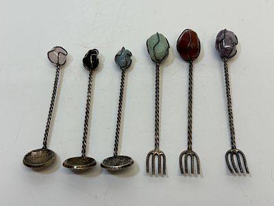 A set of six coin and gemstone novelty hors d'oeuvre forks and spoons. A set of six novelty 