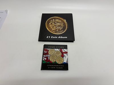 A Collection of UK Nickel-Brass Round One Pound Coins in Two Collector Albums. A collection of 
