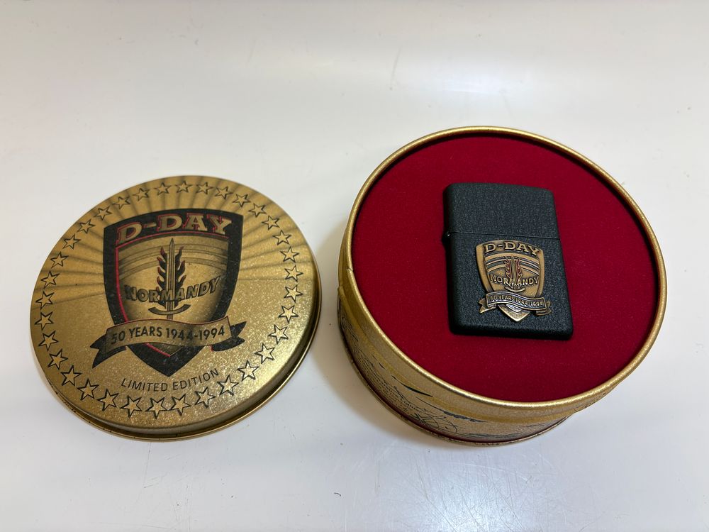 Lot 186: Zippo D-Day Normandy 50th Anniversary Commemorative Lighter and Presentation Tin