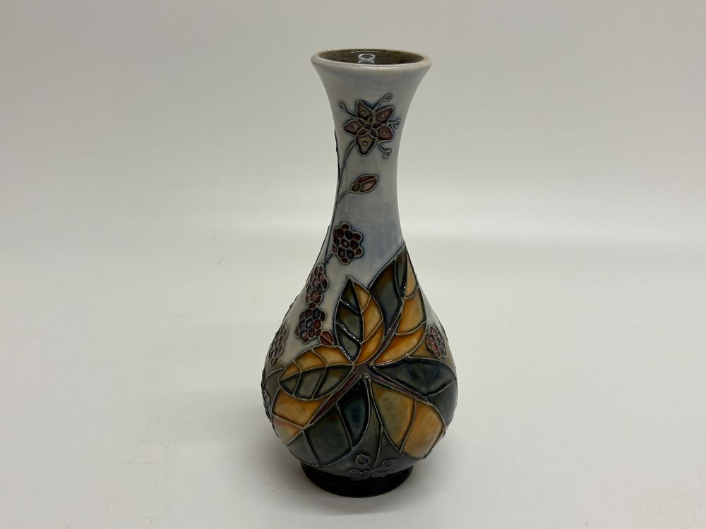 Lot 189: A Moorcroft Bramble Pattern Tubelined Earthenware Vase H = 17Cm
