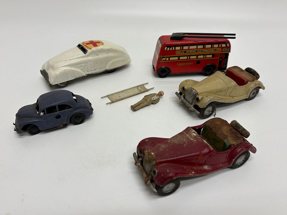 Lot 194: A Collection of Six Vintage British Toy Vehicles and Accessories including Wells-Brimtoy