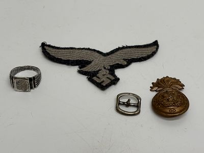 A Collection of Military Insignia and Commemorative Items including a Luftwaffe Uniform Eagle 