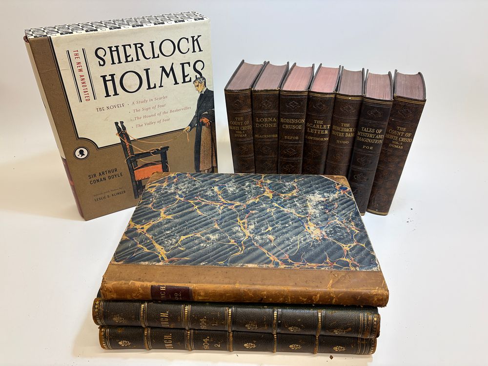 Lot 492: A Collection of The New Annotated Sherlock Holmes, Classic Literature, and Bound Volumes of Punch Magazine