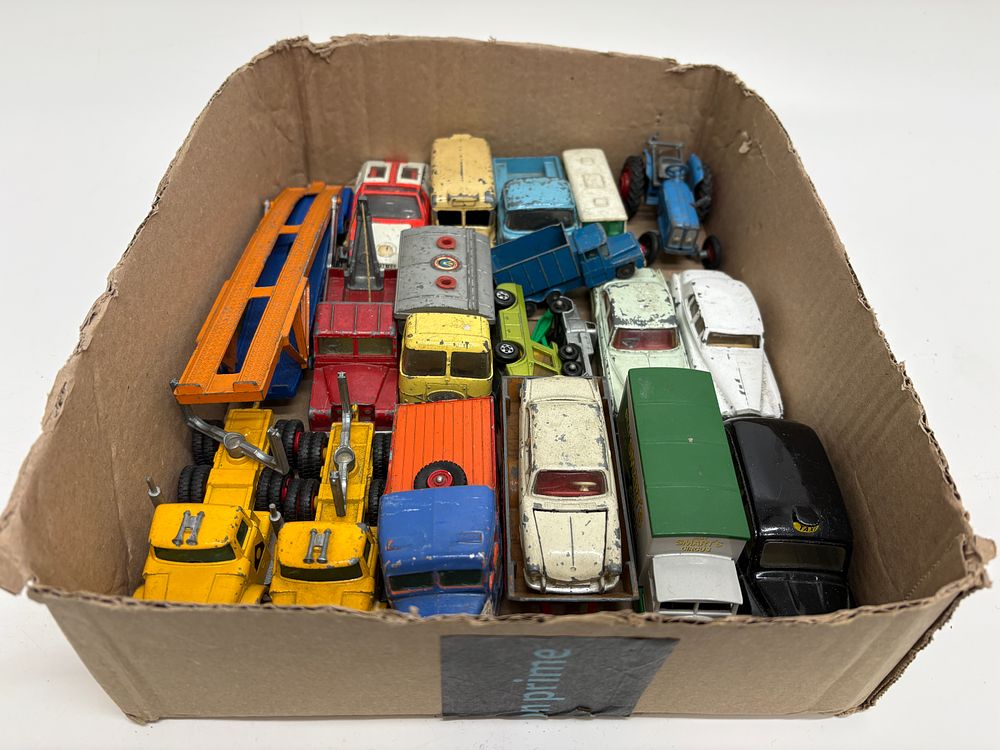 Lot 528: A Collection of Vintage Die-Cast Toy Vehicles and Accessories by Dinky, Corgi, and Matchbox