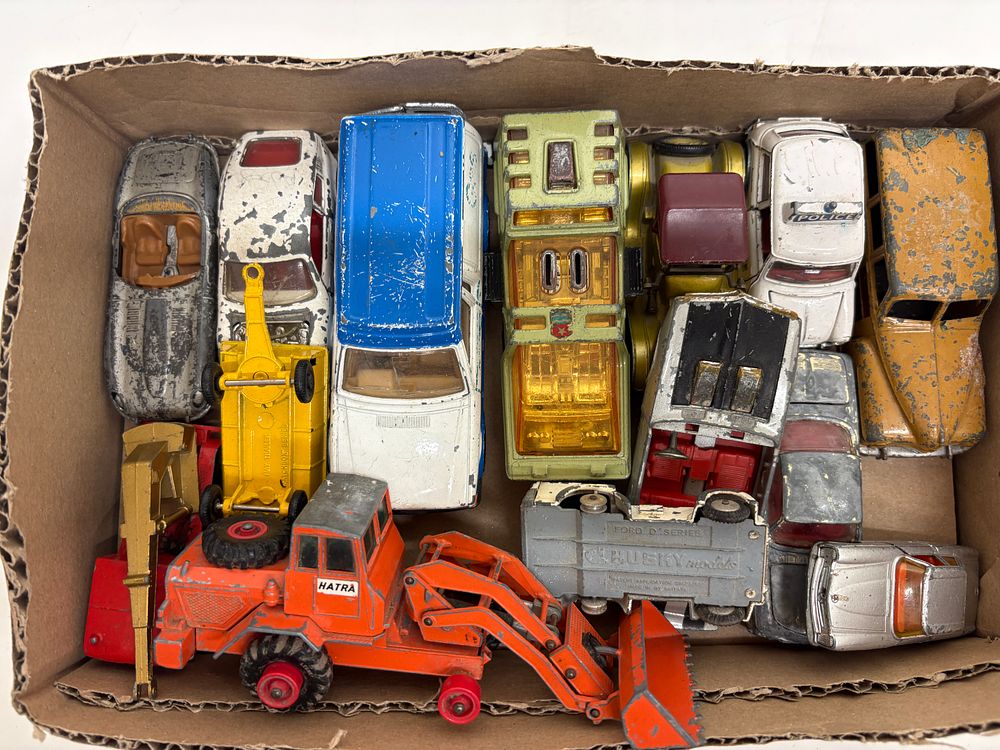 Lot 540: An Assortment of approximately 14 Vintage Play-worn Die-cast Model Vehicles including Matchbox and Husky