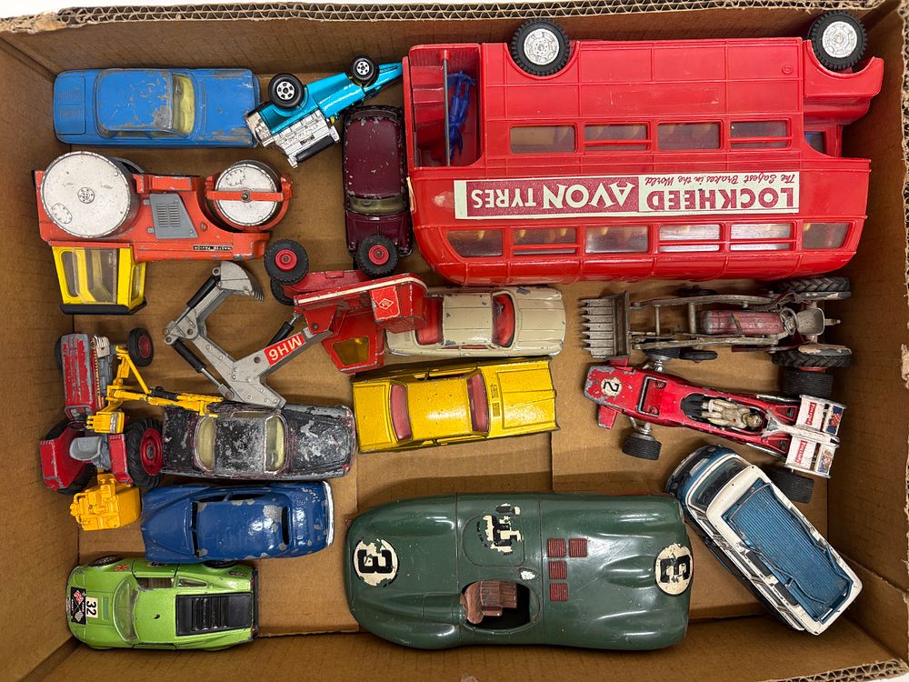 Lot 544: A Collection of Approximately 16 Vintage Die-cast and Plastic Toy Vehicles including Matchbox Models