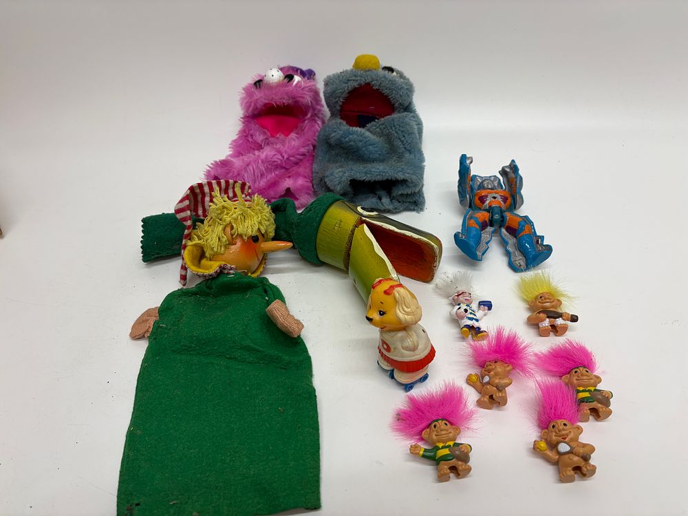 Lot 545: A Collection of Vintage 1980s Toys and Hand Puppets Including Rock Lords Brimstone and Get Along Gang Dotty Dog