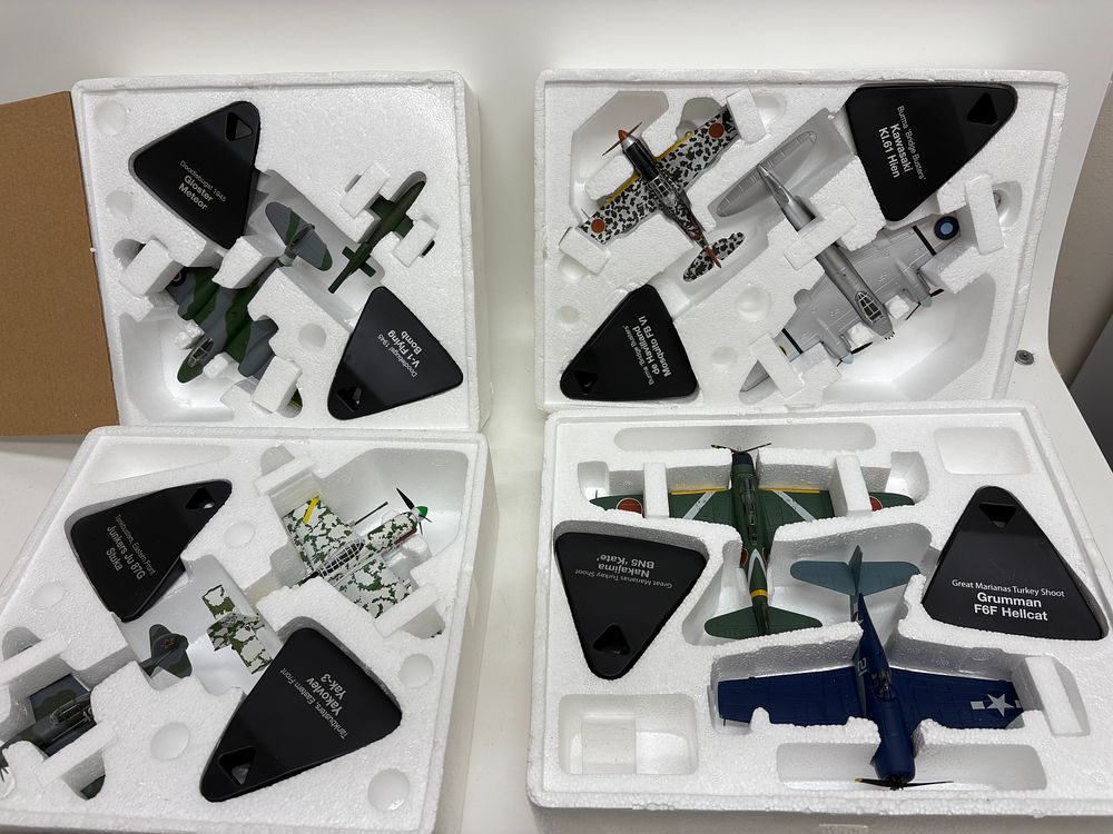 Lot 550: A Collection of Four Atlas Editions WWII Series Die-cast Model Aircraft Sets