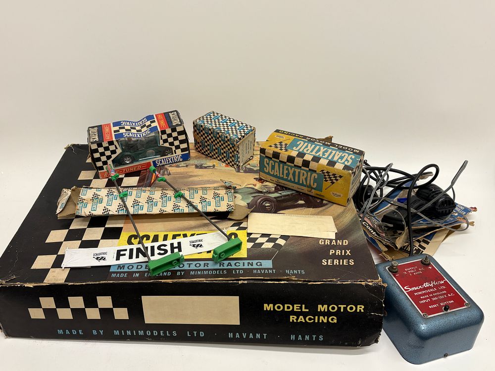 Lot 561: A Collection of Vintage Tri-ang Scalextric Model Motor Racing Sets and Accessories