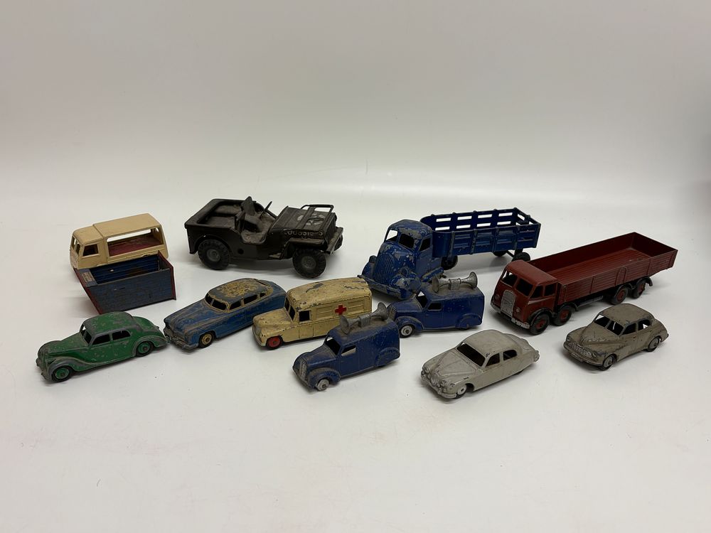 Lot 574: Twelve Dinky Toys Die-cast Vehicles and Two Components