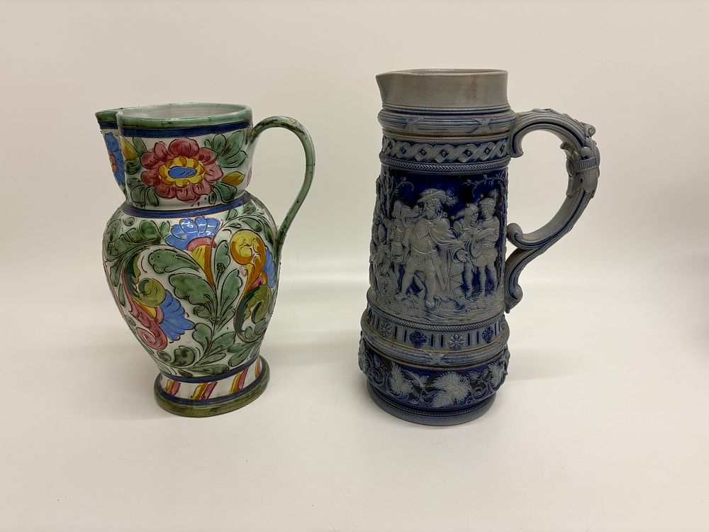 Lot 576: Two Ceramic Pitchers including an Italian Hand-Painted Earthenware Jug and a Simon Peter Gerz German Salt-Glazed Stoneware Stein