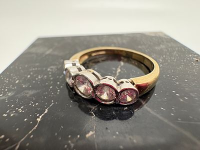 A 9 Carat Gold Five CZ-Stone Graduated Ring Total 2.73g SIZE Q. A five-stone graduated bridge 