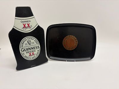 Two Items of Advertising Memorabilia including a 2011 Guinness Bottle Shaped Chopping Board and 
