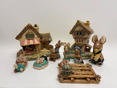 A Collection of Pendelfin Pottery Rabbit Figurines and Buildings. A collection of Pendelfin 