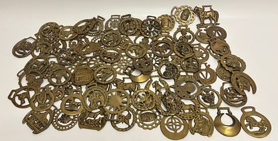 A Collection of Antique and Vintage Cast Brass Horse Brasses. A large assortment of cast brass 