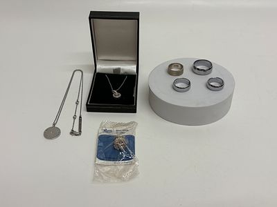 An Assortment of Michael Kors and Sterling Silver Jewellery & Florin Rings. An assortment of 