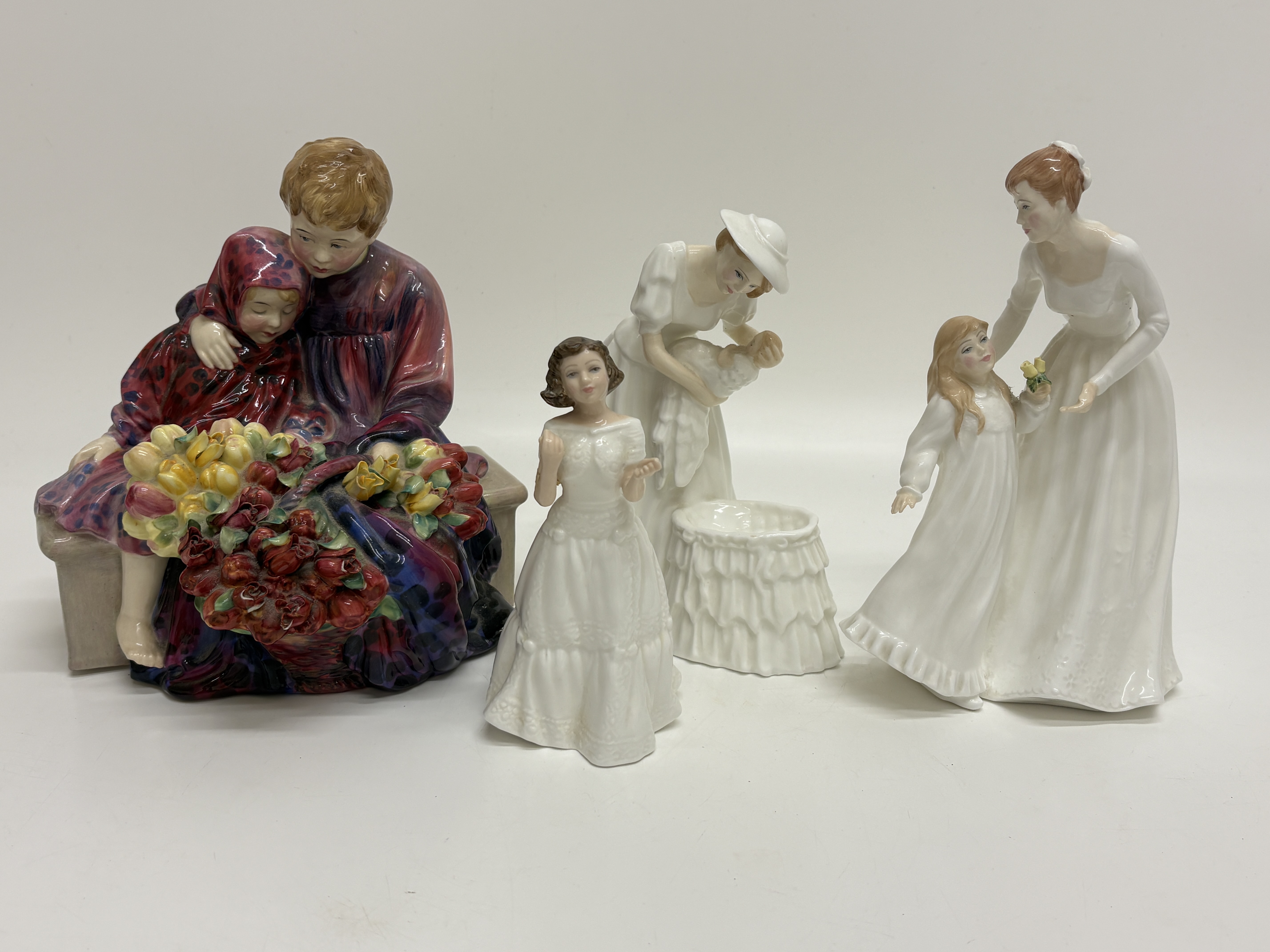 A Collection of Royal Doulton Porcelain and Bone China Figurines