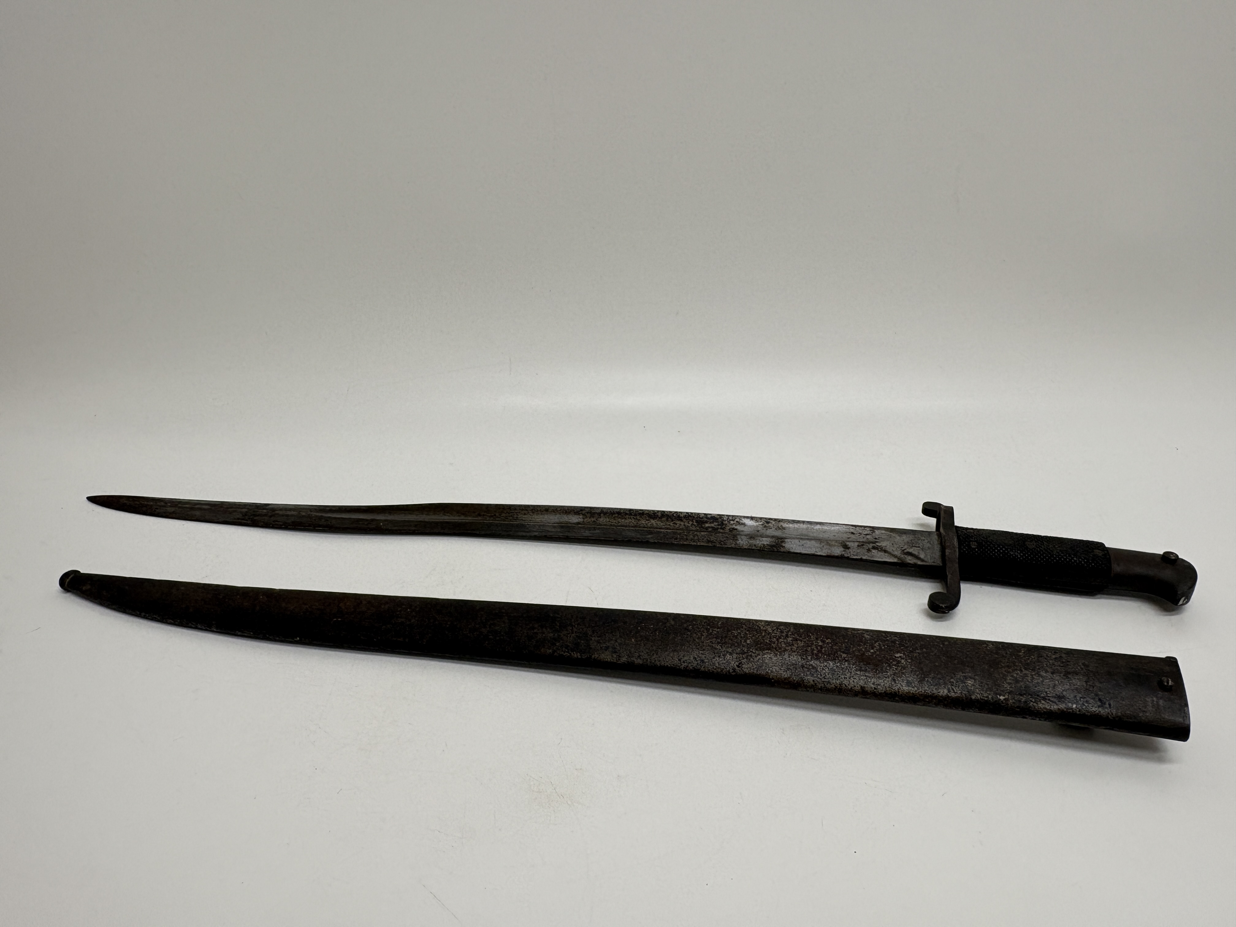 A British Pattern 1856/58 Enfield sword bayonet with steel scabbard