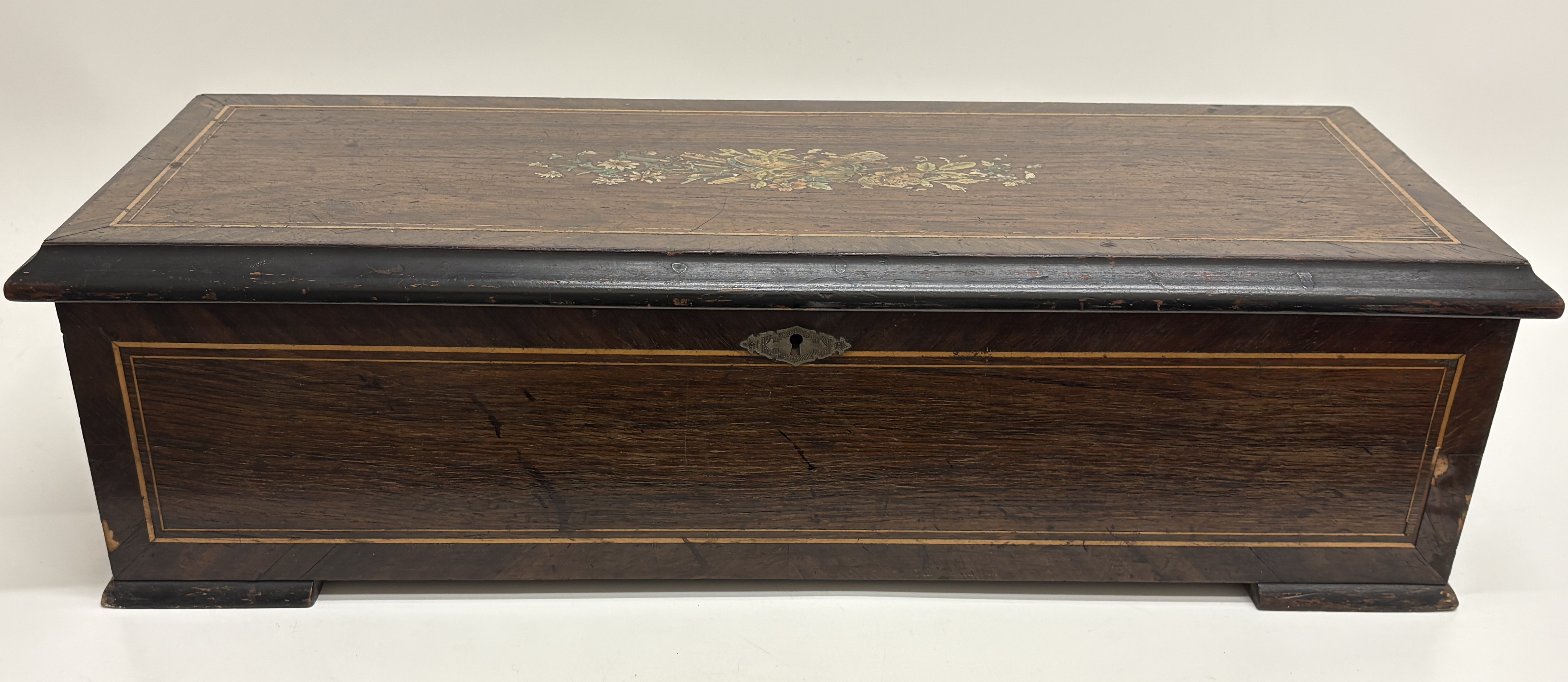 A large 19th-century Swiss rosewood and marquetry twelve-tune cylinder music box 65x18x22