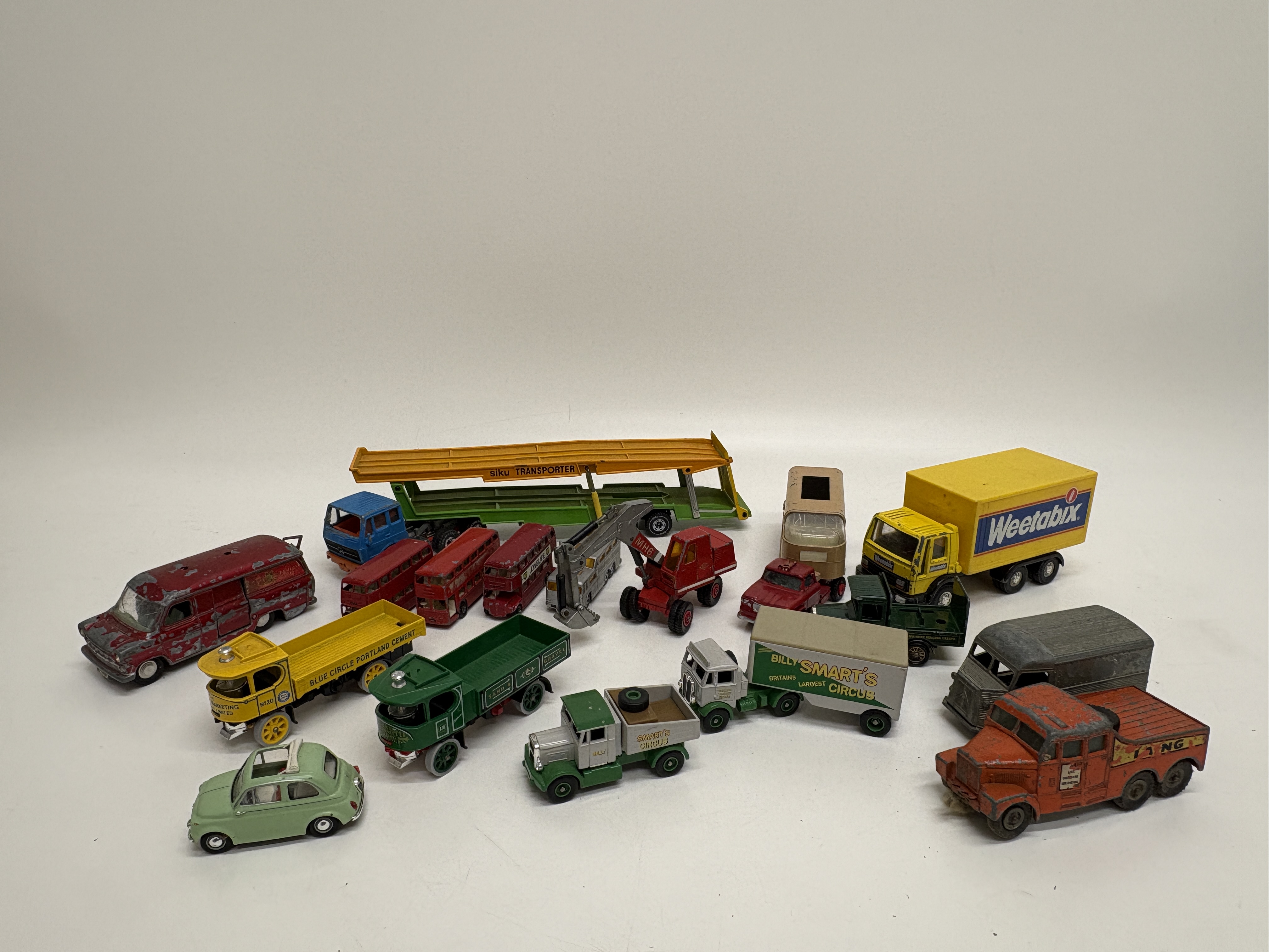 A Collection of Approximately 18 Vintage Die-Cast Toy Vehicles by Lesney Matchbox, Siku and Others