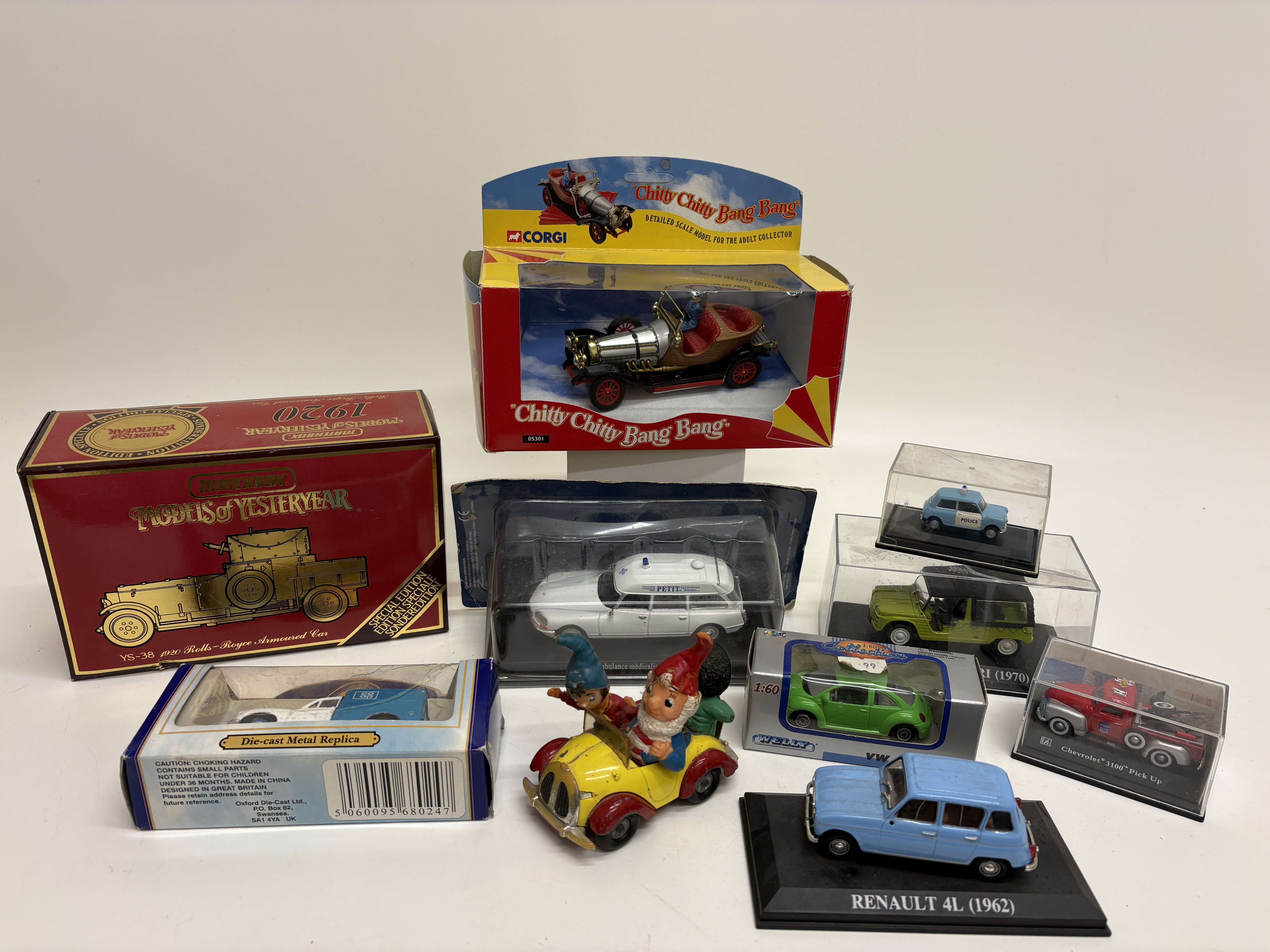 A collection of die-cast and mixed-media toy vehicles including Matchbox and Corgi examples