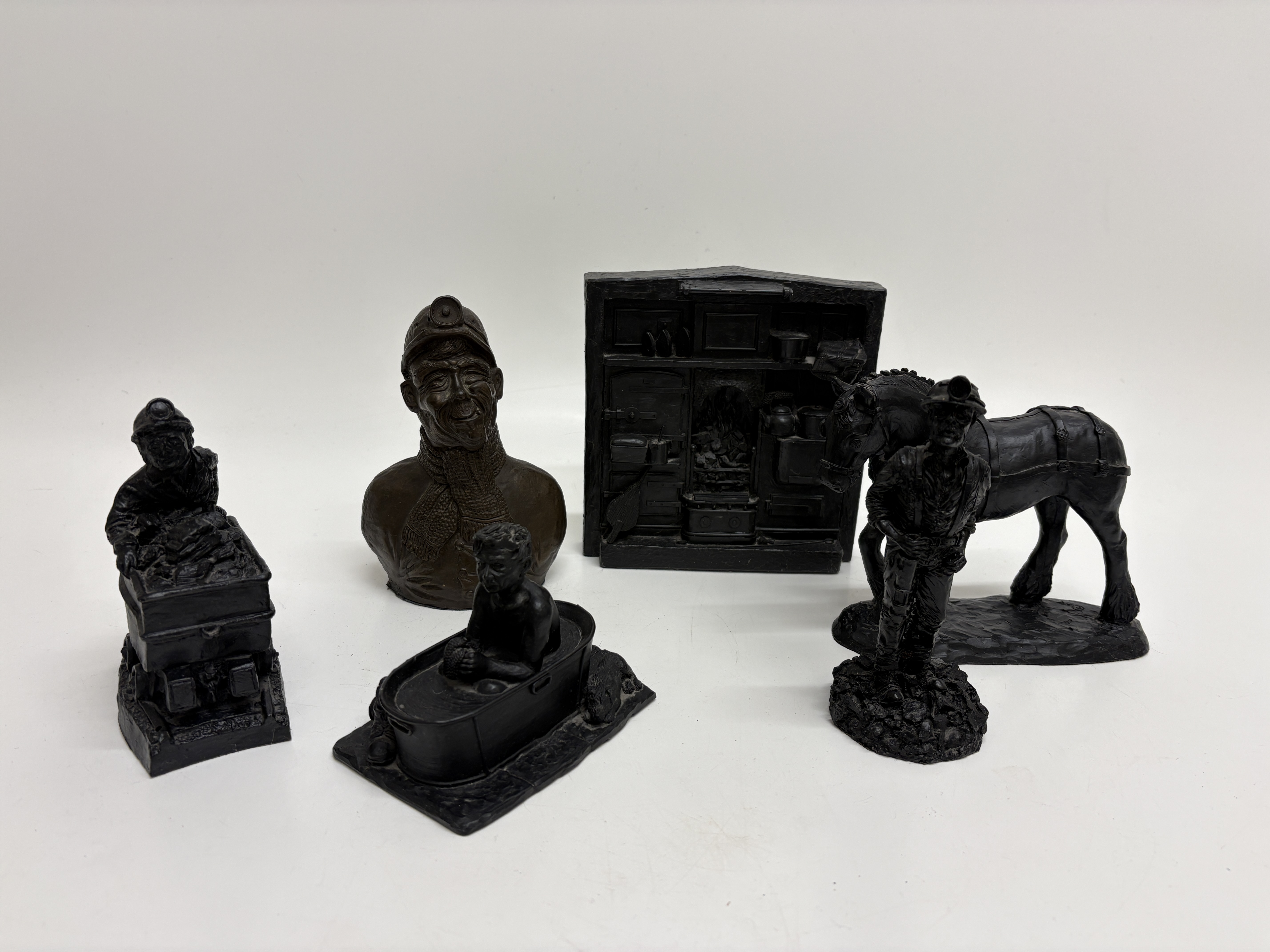 A Collection of Memories Handcrafted Figures Made of Coal