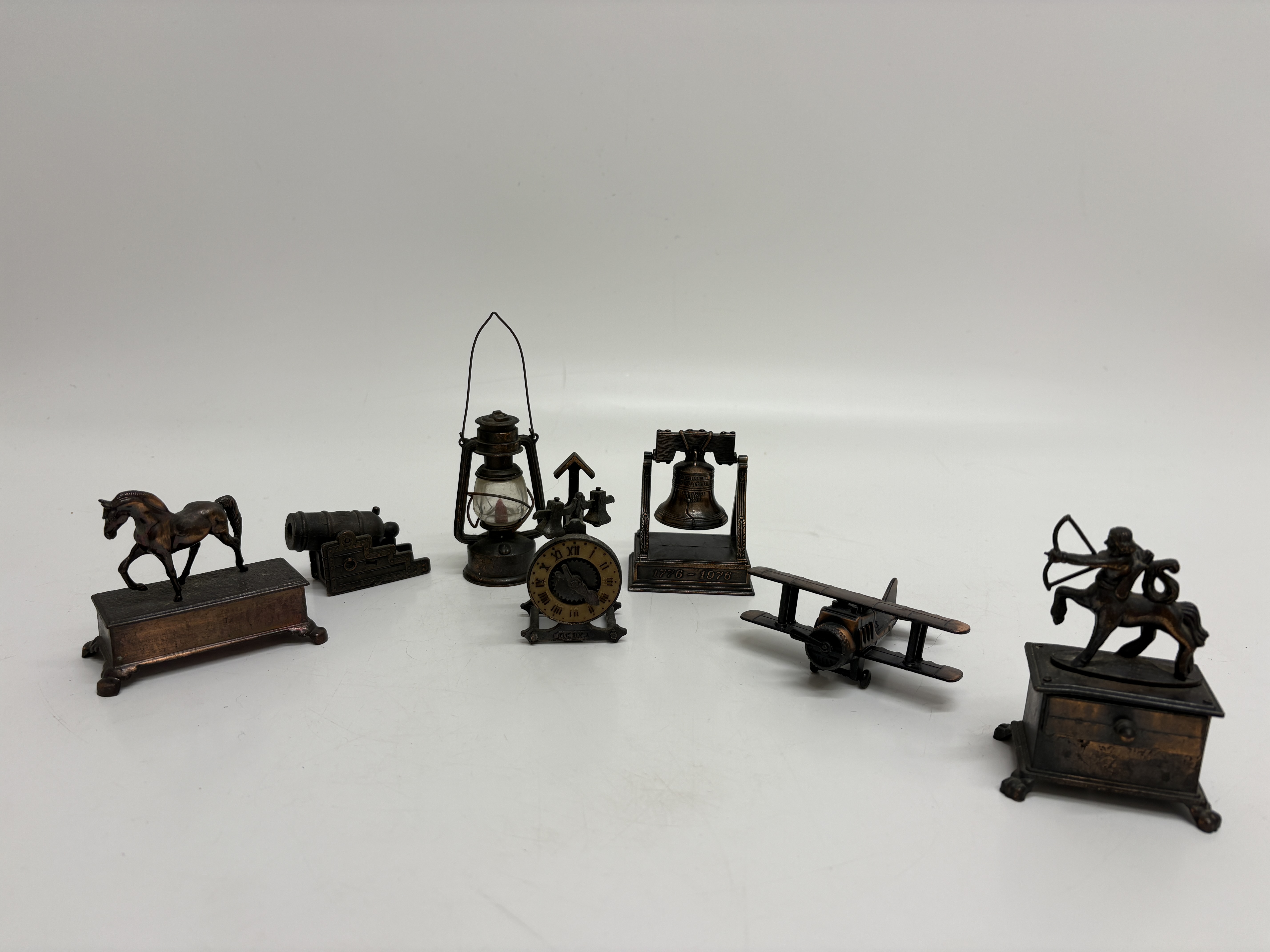 A Collection of Seven Vintage Die-Cast Metal Novelty Pencil Sharpeners