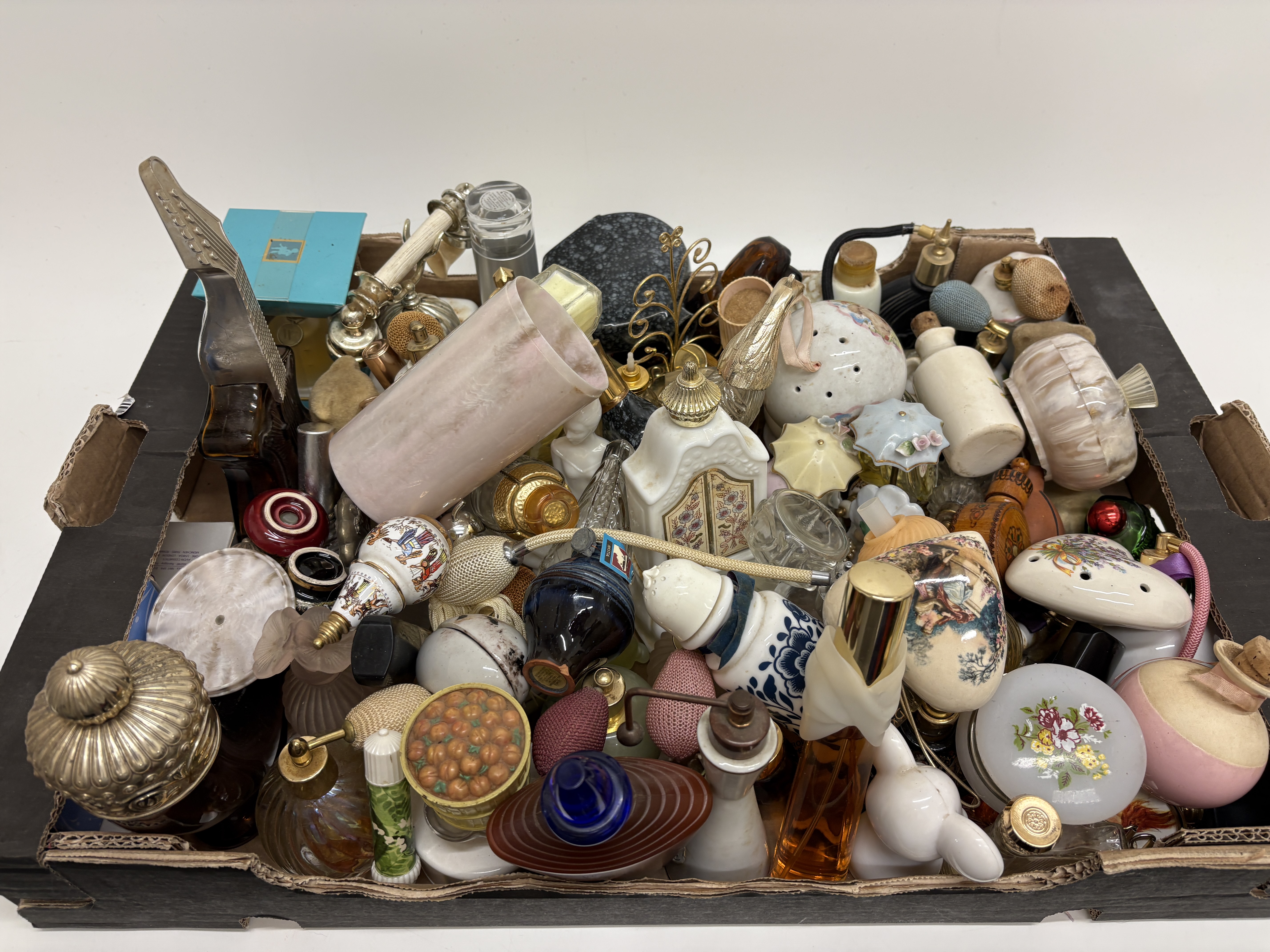 A Collection of Vintage Avon and Assorted Ceramic and Glass Perfume Bottles and Vanity Items